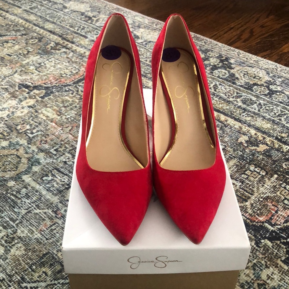 Red suede pumps